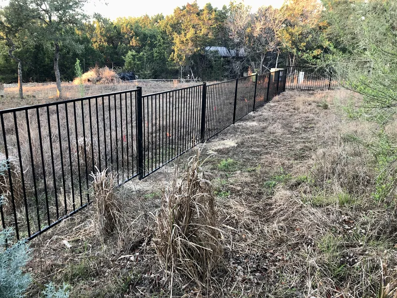 4ft tall black metal fence with wrackable panels in Austin Hill Country