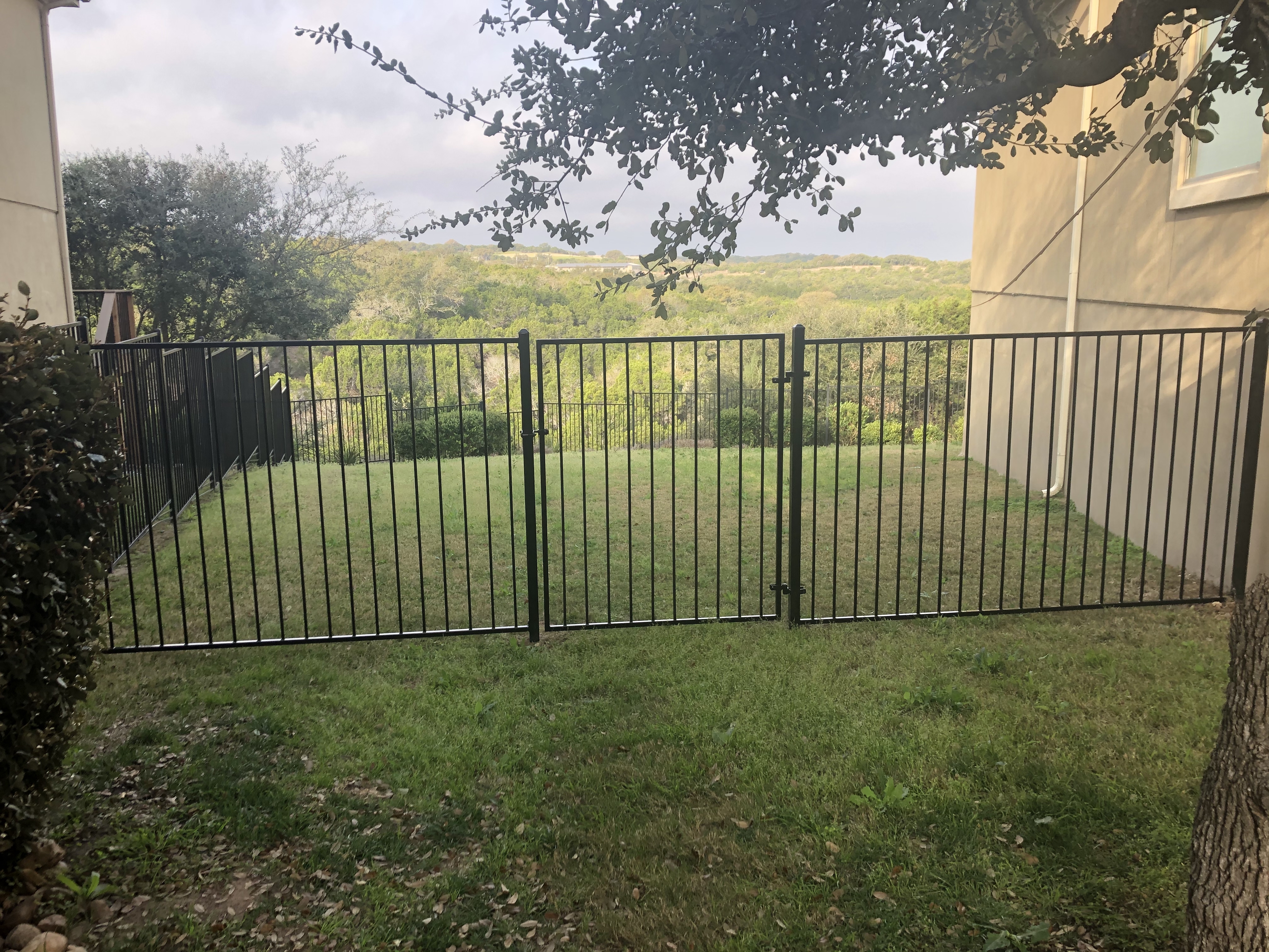 5ft tall black metal fence with scenic view in Austin, TX
