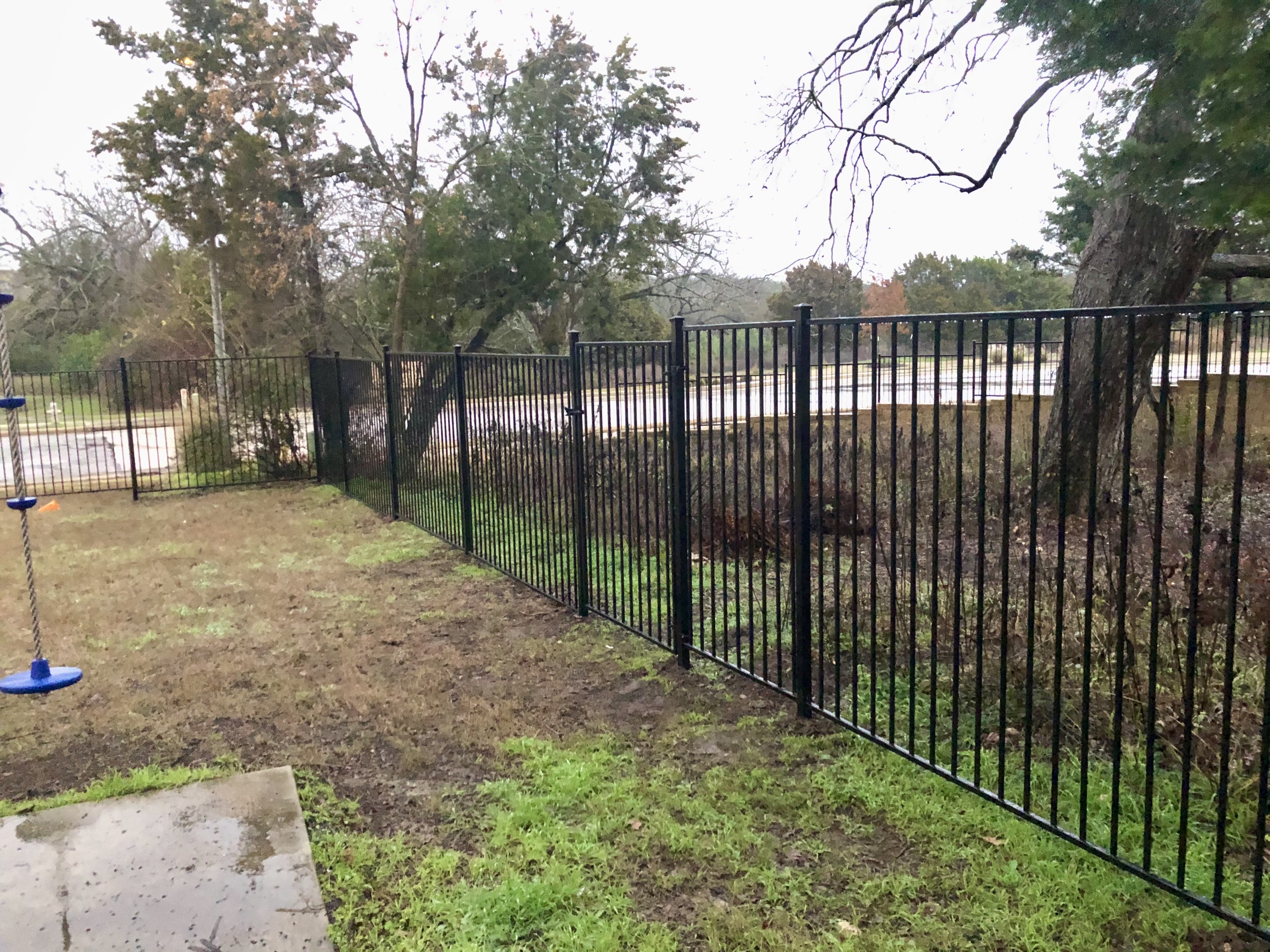 6ft tall black metal privacy fence in Austin, TX