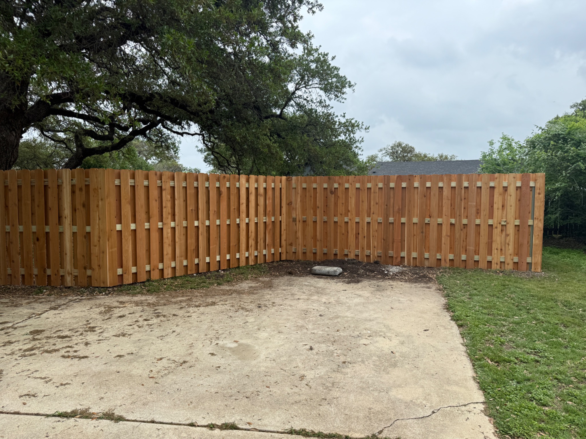 Cedar shadowbox fence installation in Austin, TX