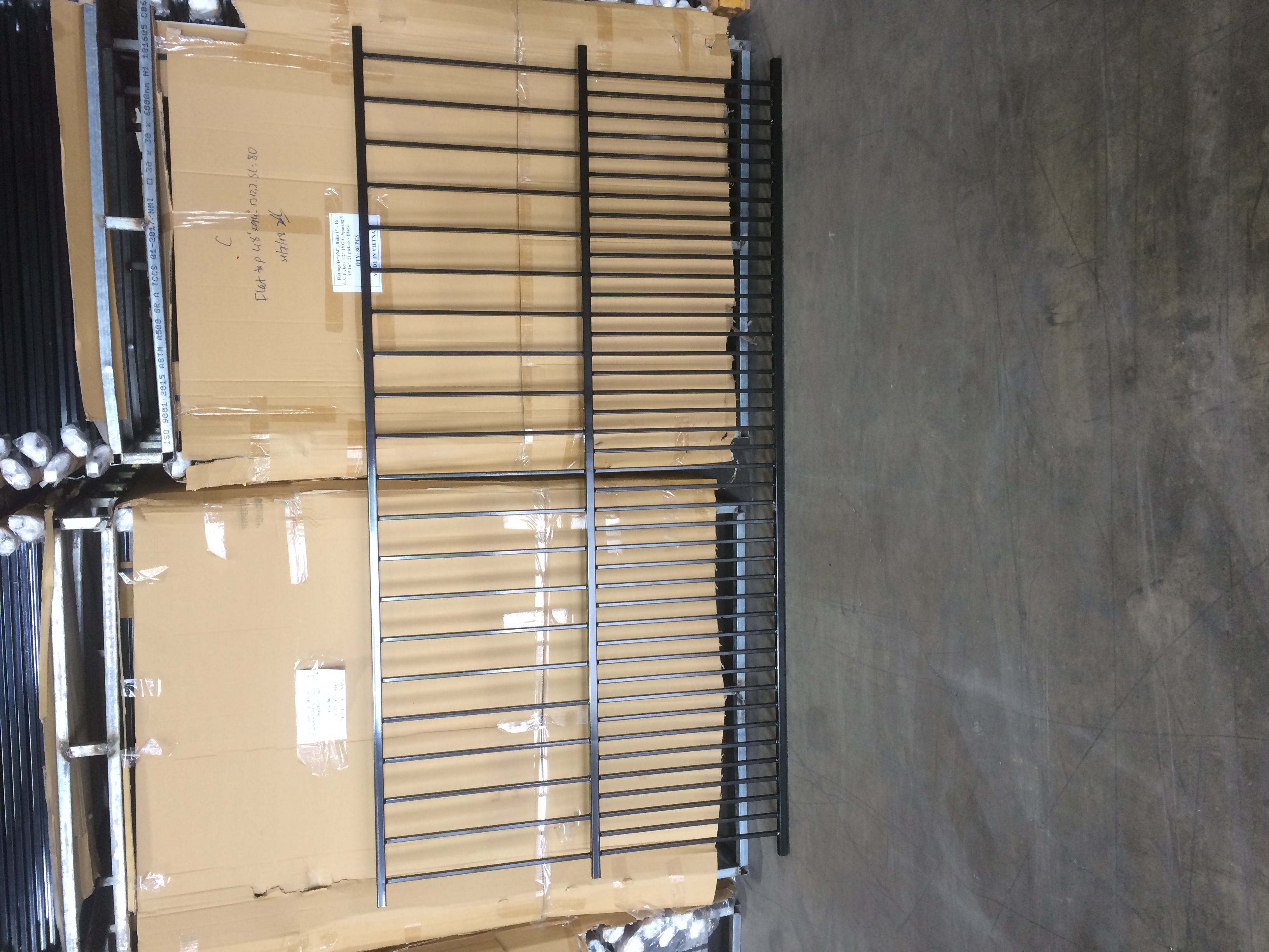 Metal puppy panel fence with closer picket spacing