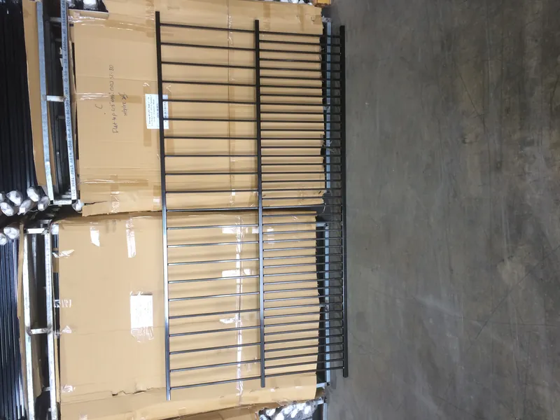 Metal puppy panel fence with closer picket spacing