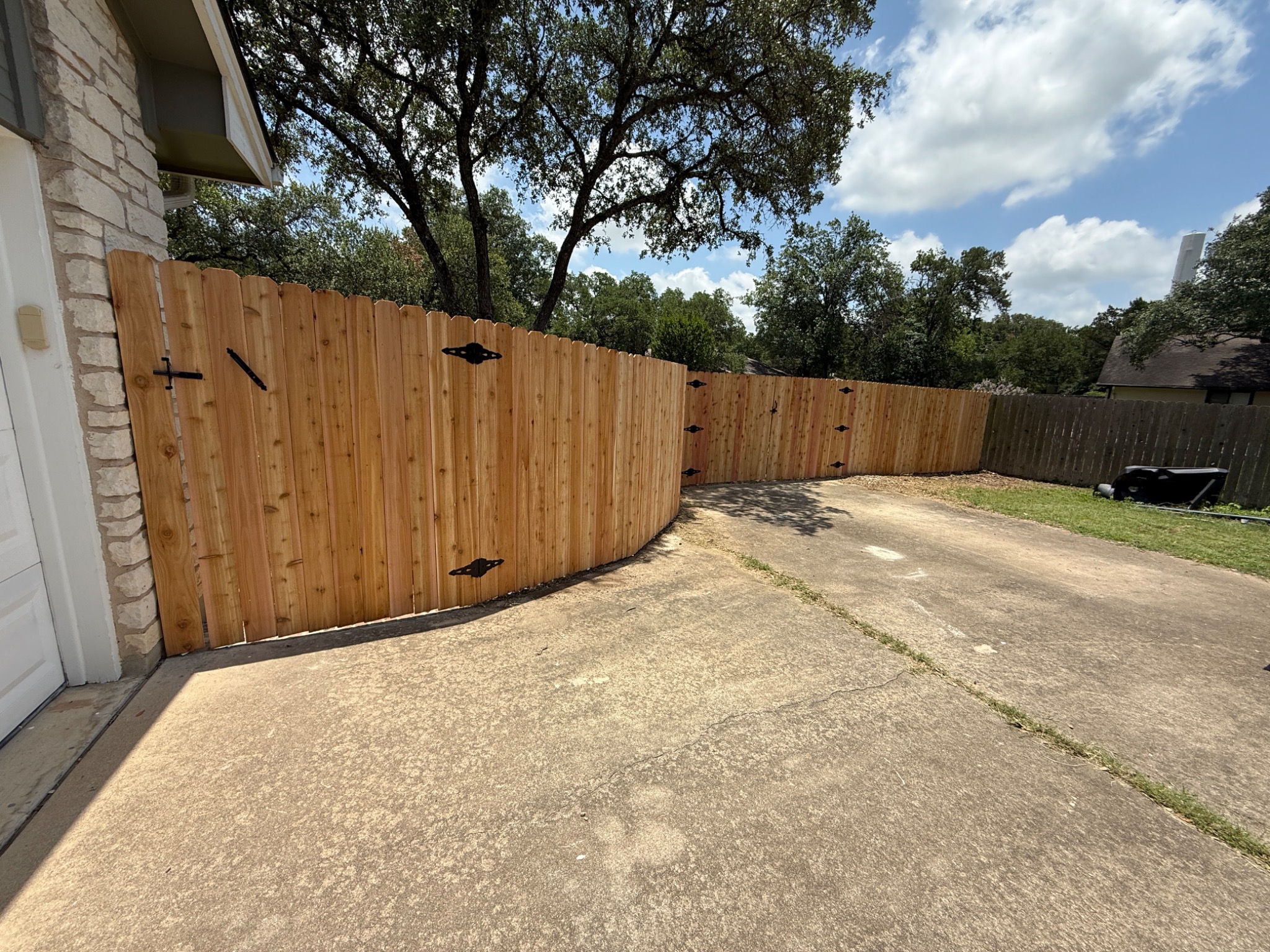 Cedar privacy fence with custom gate in Austin, TX