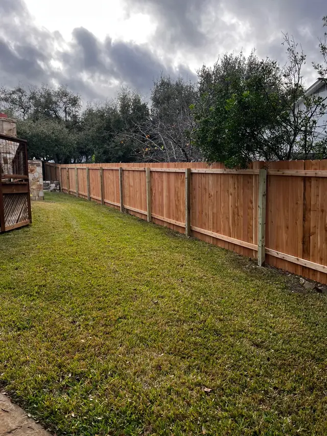 Treated wood fence post installation